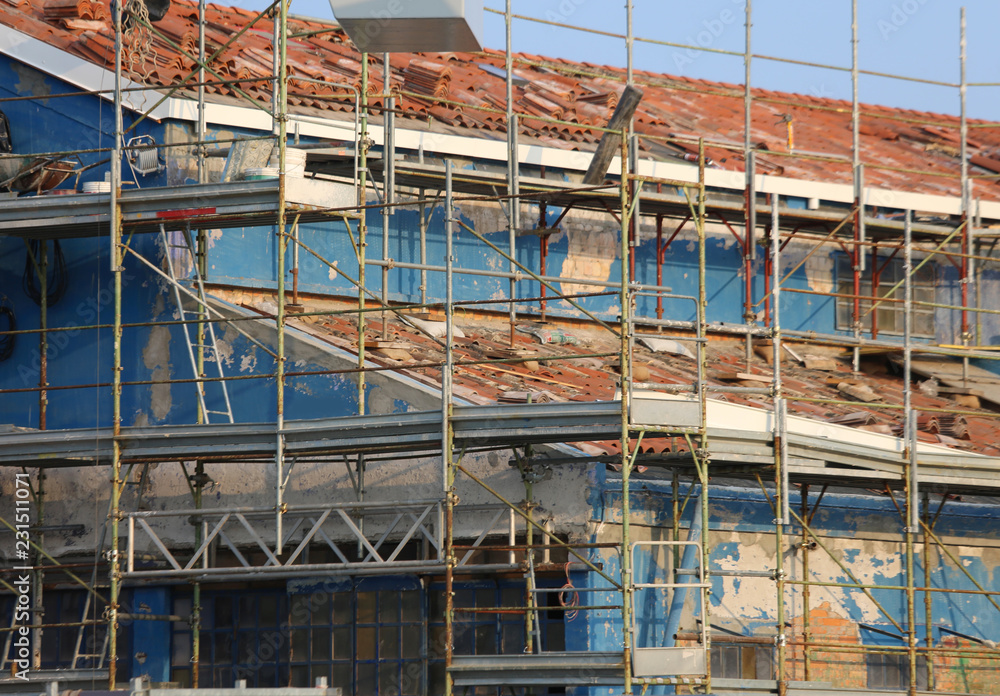 scaffolding of the construction site of a house during the works