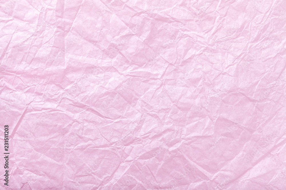 Crumpled pink wrapping paper, closrup.