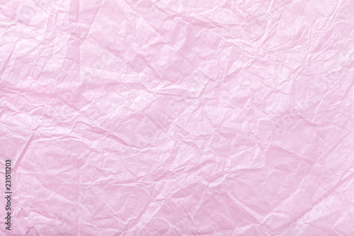 Crumpled pink wrapping paper, closrup. photo