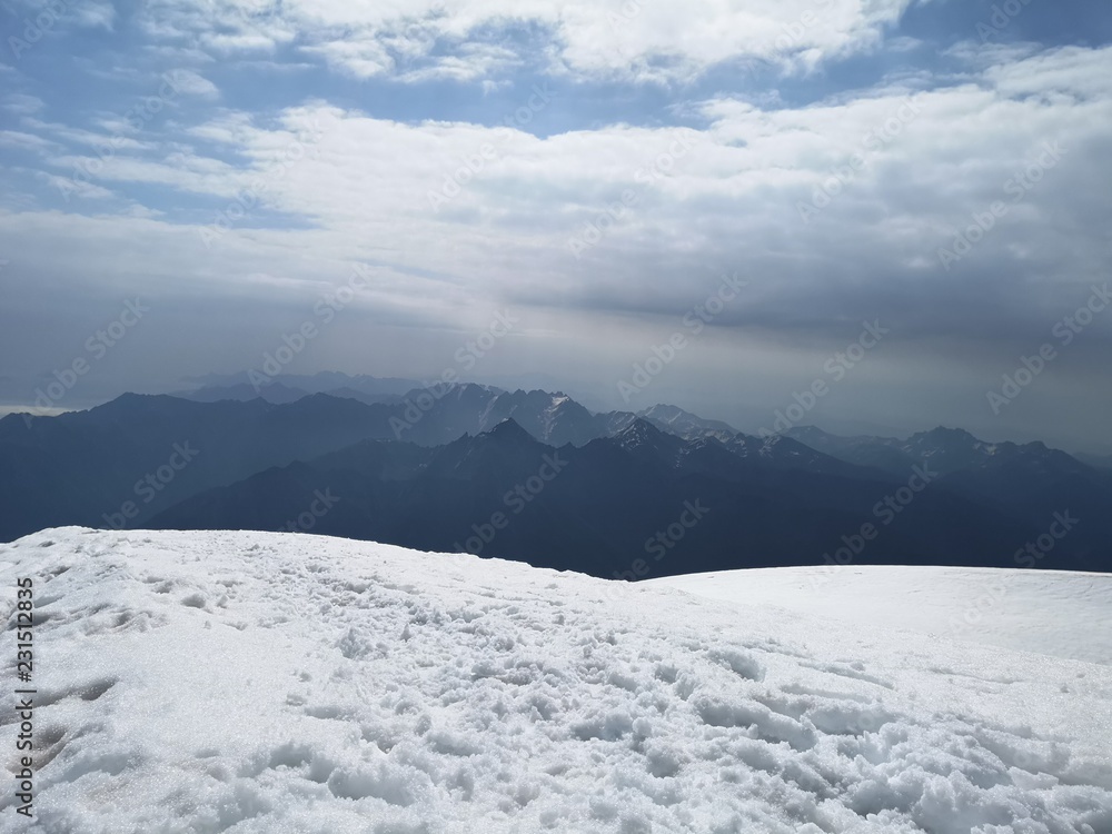 Naklejka premium winter landscape with mountains and clouds