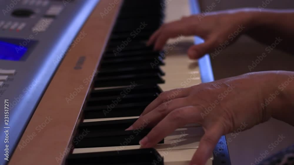 hands playing piano hands playing piano