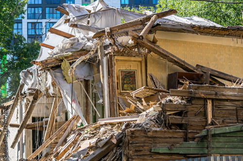 Demolition of old wooden house