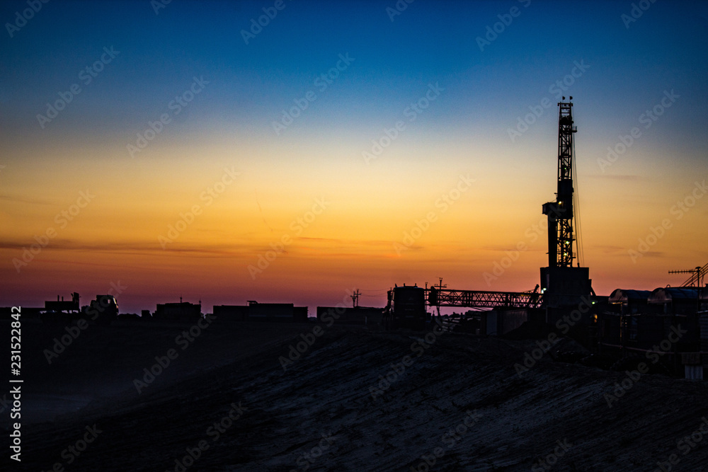 silhouette of the rig at sunset silhouette of the rig at sunset