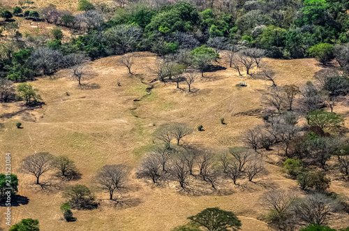 Fotografie Dry season and drought over the fields, a well gives some hope, Guanacaste, Cost