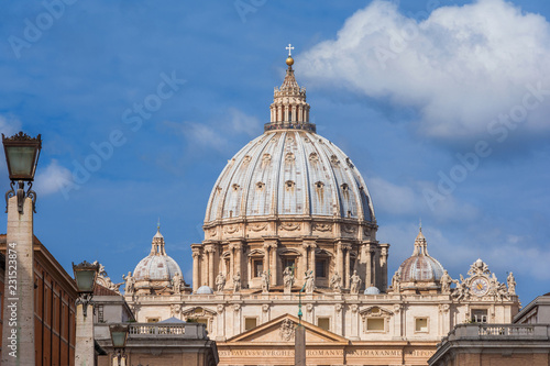 Fototapeta View of the beautiful Saint Peter Dome with clouds and the Moon, from Via della