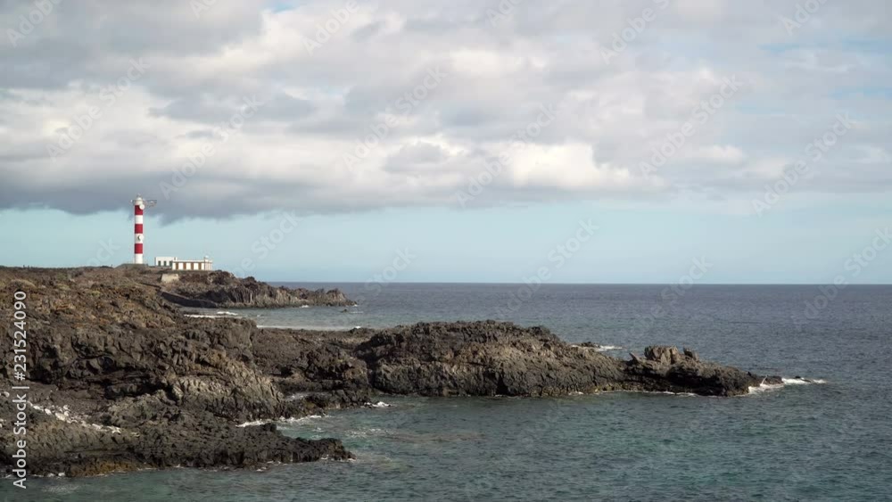 Lighthouse on the rocky coast of Tenerife, Spain Lighthouse on the rocky coast of Tenerife, Spain