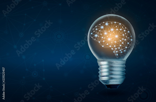 brain light bulb human brain glowing inside of light bulb on dark blue background