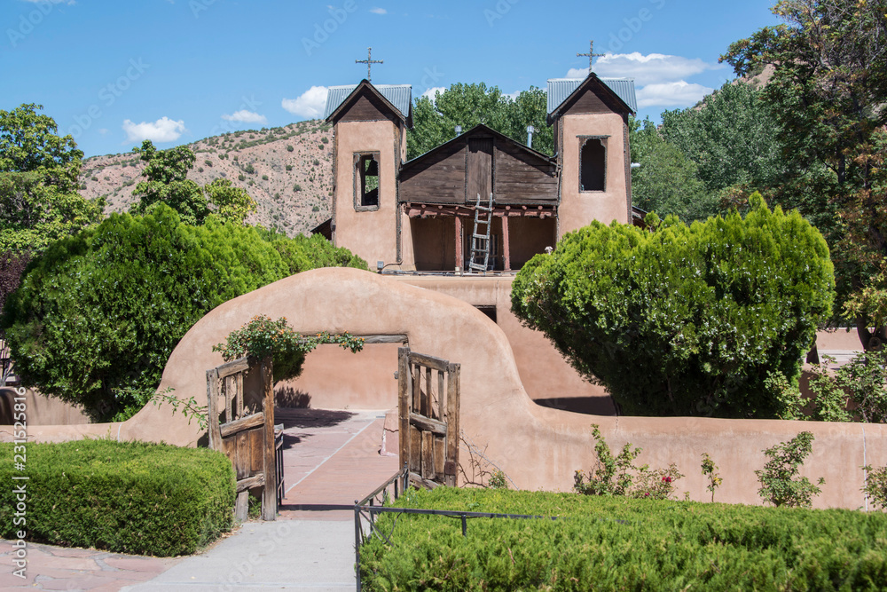 Santuario De Chimayo historic entrance way into adobe Roman Catholic