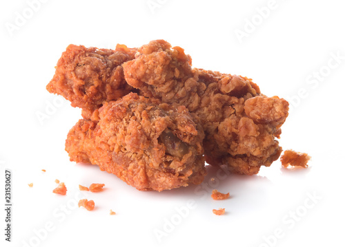 Spicy fried chicken wings on white background
