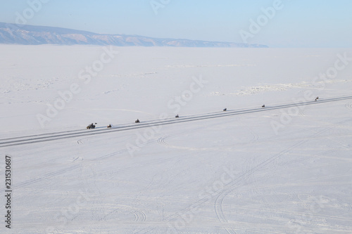 Car track in fresh snow. Lake Baikal