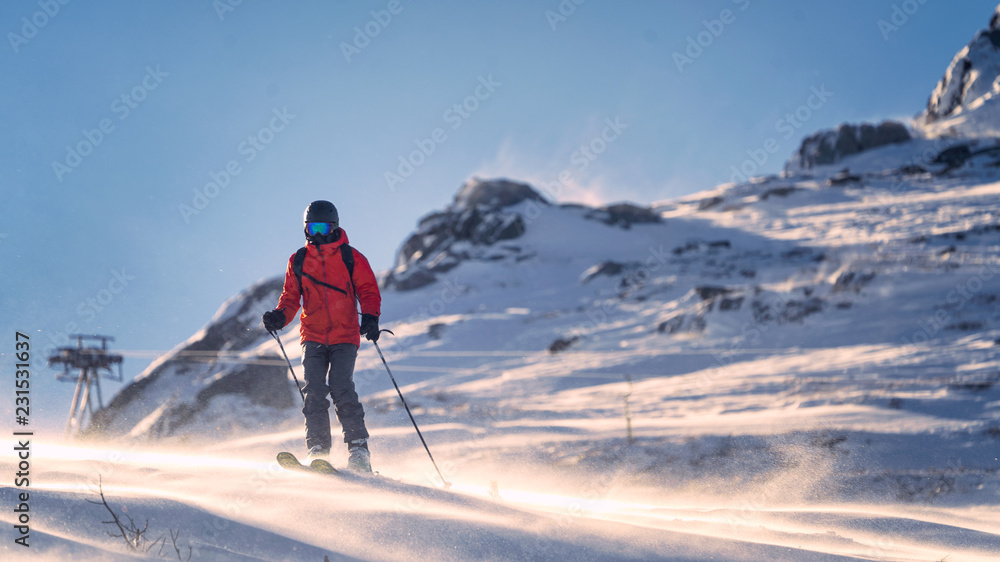 Skier in winter, strong winds in the mountains of the Natural Park Ergaki