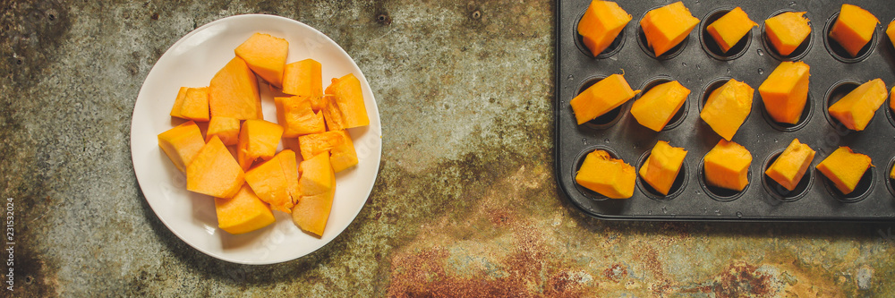 orange pumpkin (pieces of fresh pumpkin). Vegan food. Flat lay. Diet menu. Top view orange pumpkin (pieces of fresh pumpkin). Vegan food. Flat lay. Diet menu. Top view