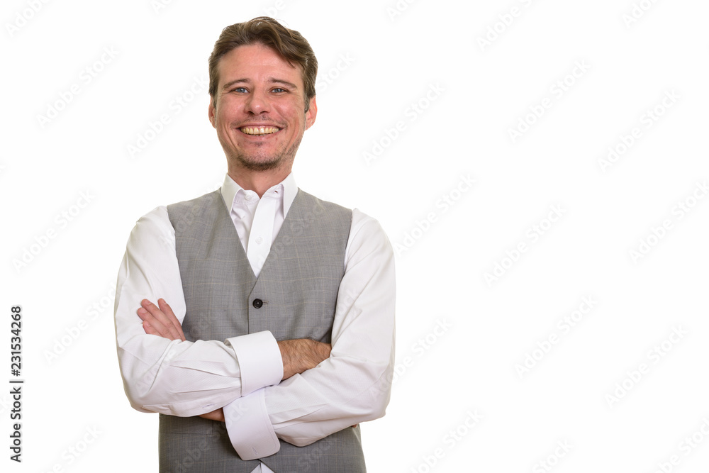 Happy formal Caucasian man smiling wearing vest Happy formal Caucasian man smiling wearing vest