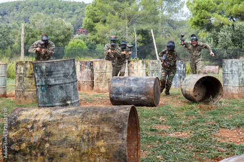 Group of people playing paintball