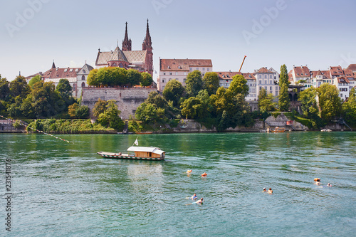 Quadro su tela Scenic view of Rhine embankment with ferry boat in Basel, Switzerland