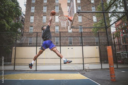 Basketball player training on a court in New york city