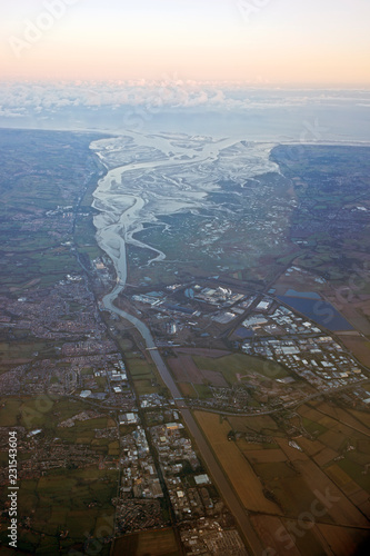 Aerial shot of the Dee estuary and the Wirral, England, UK, evening light. photo