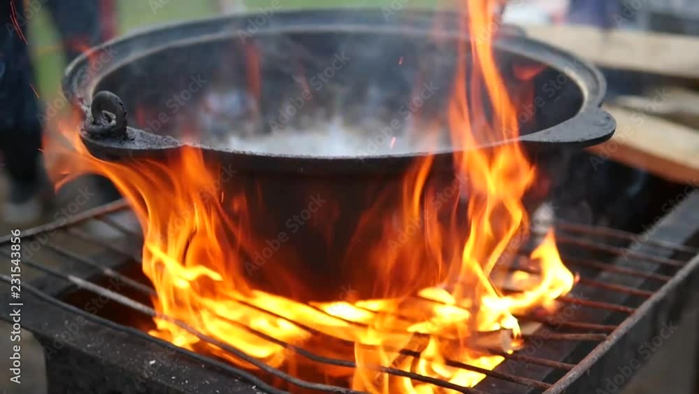 Pilaf, on the boiler, on the grill, on an open fire. Removes coals, ash flies. Pilaf, on the boiler, on the grill, on an open fire. Removes coals, ash flies.