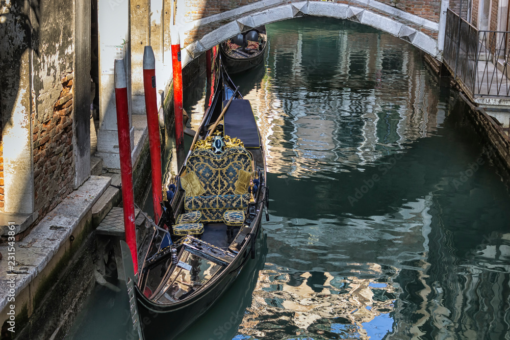 Venice, Italy - 2/21/2016.Gondola moored in canal Grande;