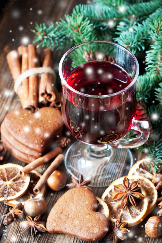 Glass with mulled wine and spices Glass with mulled wine and spices