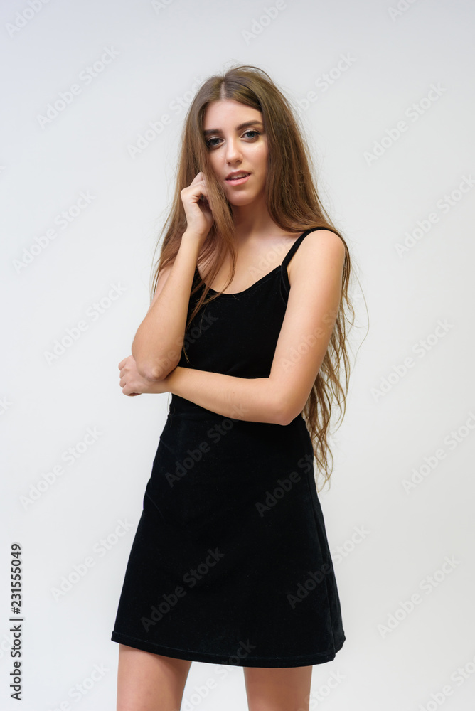 Studio portrait of a smiling happy beautiful brunette girl on white background. Studio portrait of a smiling happy beautiful brunette girl on white background.