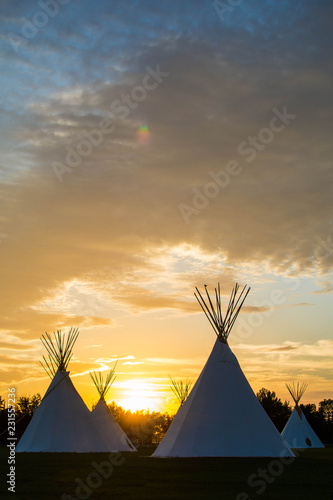 Indigenous Tee Pee on the Prairie at Sunset   photo