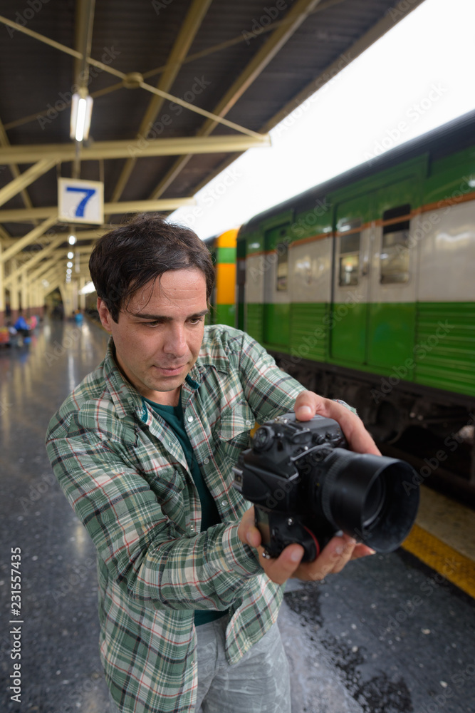 Handsome Persian tourist man at the railway station in Bangkok, Handsome Persian tourist man at the railway station in Bangkok,