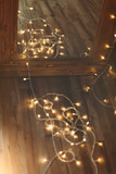 Christmas concept picture: holiday garland reflecting in the mirror.