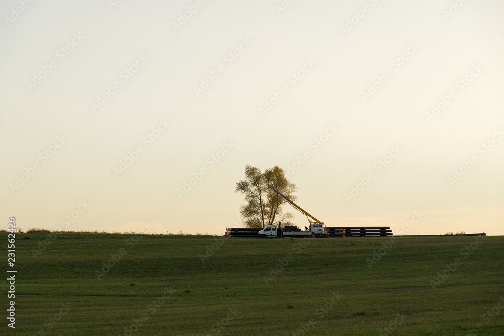 Fototapeta premium Sunrise and sunset over the hills and town. Slovakia