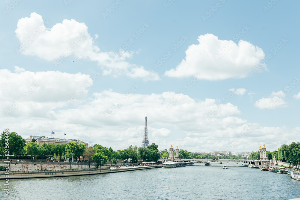 PARIS, FRANCE - 02 June 2018 : View of the Eiffel Tower and Siene River in Paris, France.