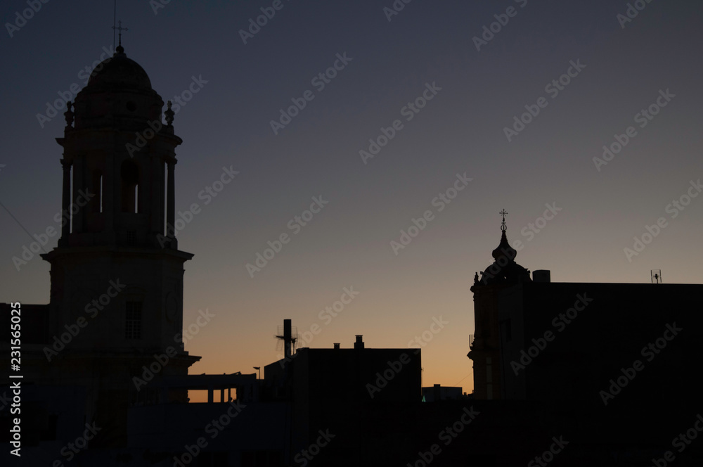 Sunset silhoutte with cathedral cupolas in old city
