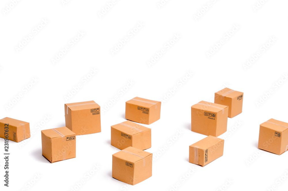 Cardboard boxes on a white background. The concept of packing goods, sending orders to customers. Warehouse of finished products and equipment. Moving to another house. Delivery management. Cardboard boxes on a white background. The concept of packing goods, sending orders to customers. Warehouse of finished products and equipment. Moving to another house. Delivery management.