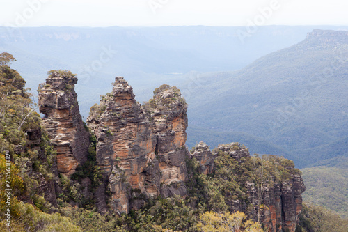 The Three Sisters Cliffs in Blue Mountains National Park, NSW, Australia, view from Echo Point. Their names are Meehni (922 m), Wimlah (918 m), and Gunnedoo (906 m)