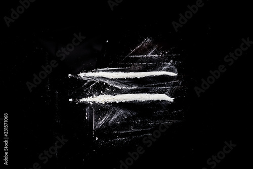 cocaine roads on a black table photo