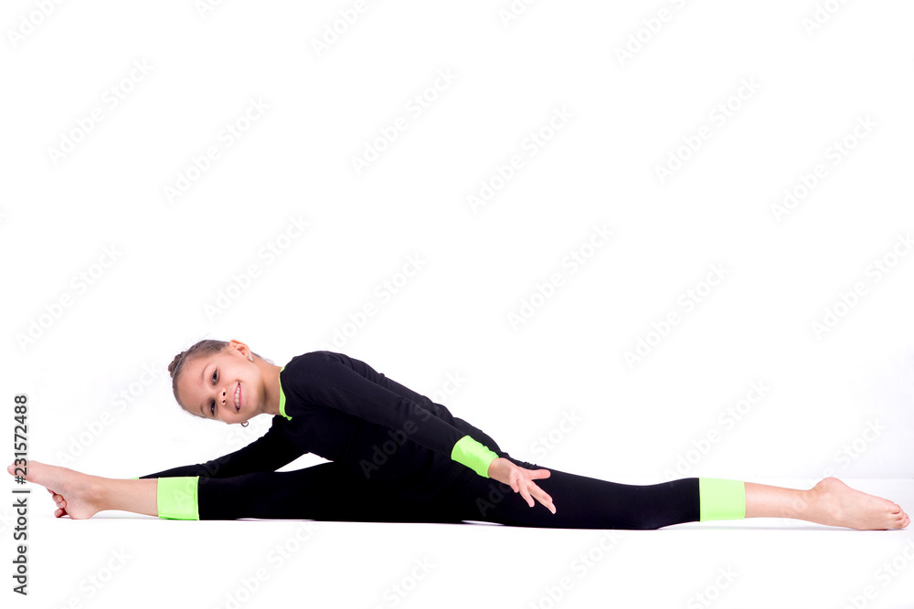 Teenager girl involved in rhythmic gymnastics. White background Teenager girl involved in rhythmic gymnastics. White background