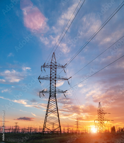 High-voltage power lines. Electricity distribution station. high voltage electric transmission tower. Distribution electric substation with power lines and transformers