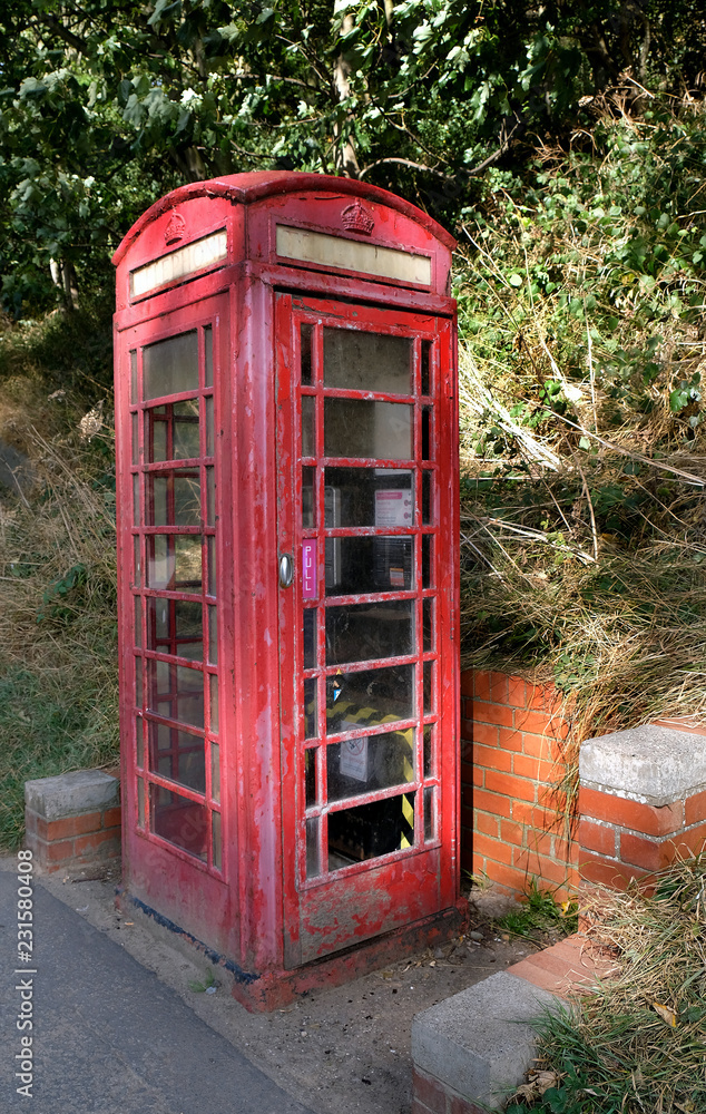 Old style UK telephone box in disrepair. Old style UK telephone box in disrepair.