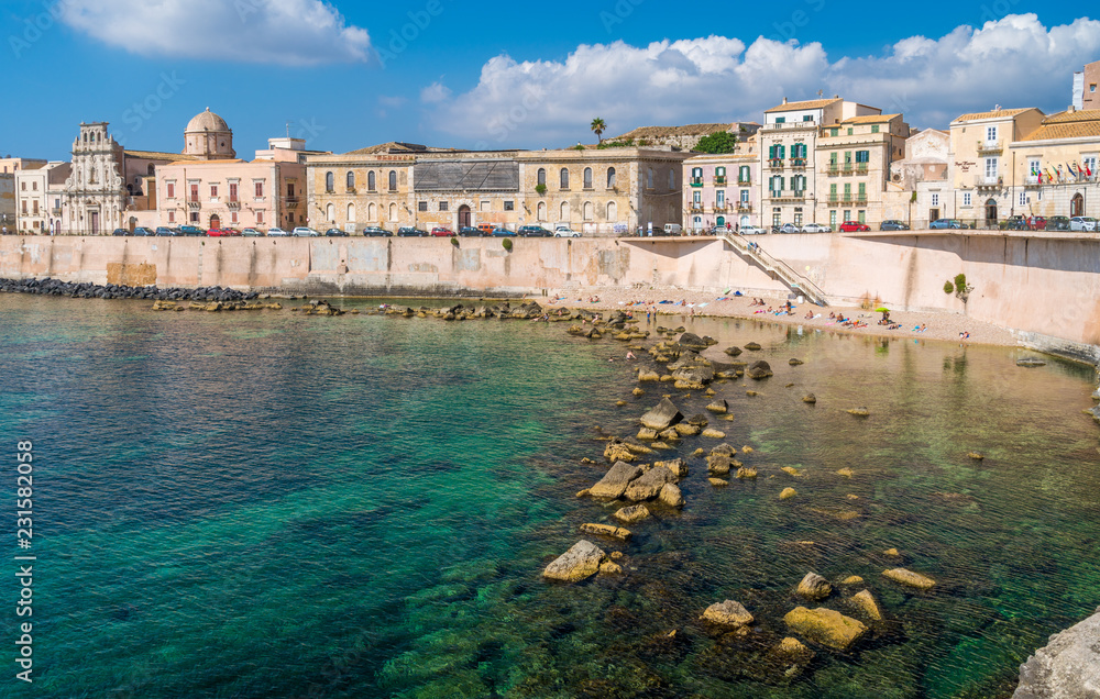 Siracusa waterfront in Ortigia on a sunny summer day. Sicily, southern Italy.