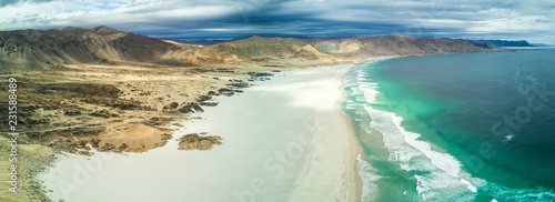 An aerial view of Pan de Azucar National Park, Atacama Desert, at the coast area an amazing landscape for geology with incredible sand formations and folds in the Earth in Playa Blanca, Copiapo, Chile
