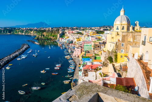 Perfect tiny seaside village with multi colored houses of Marina di Corricella, Procida Island, Naples Italy photo