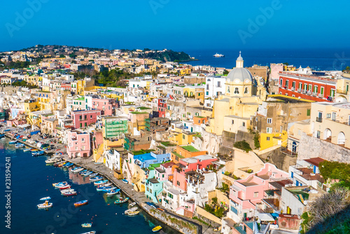 Perfect tiny seaside village with multi colored houses of Marina di Corricella, Procida Island, Naples Italy