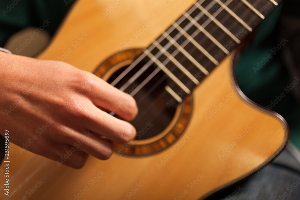 Fototapeta premium Detail of a classical guitar player