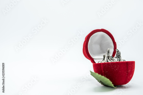 Slika na platnu Christian nativity scene on a red velvet rose flower box.