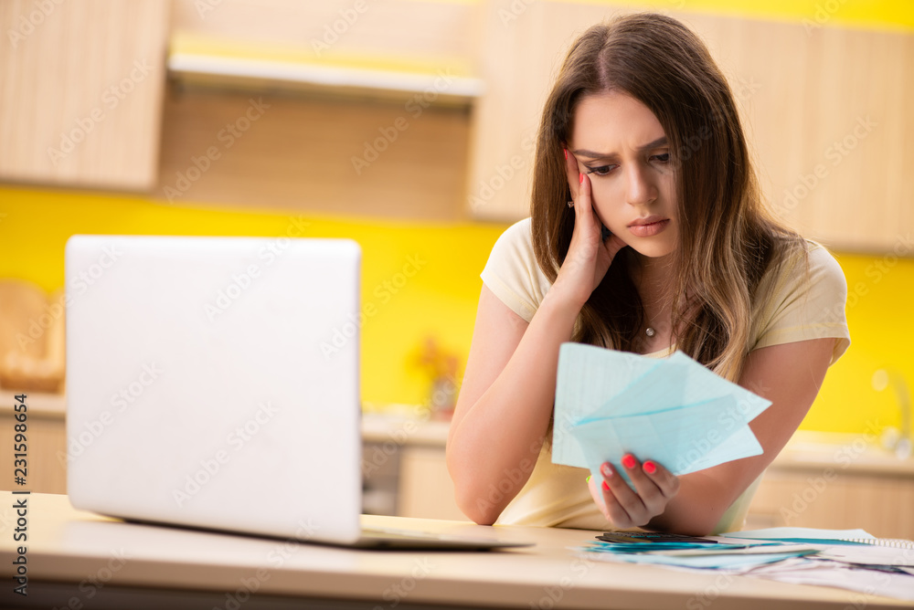Young woman wife in budget planning concept Young woman wife in budget planning concept