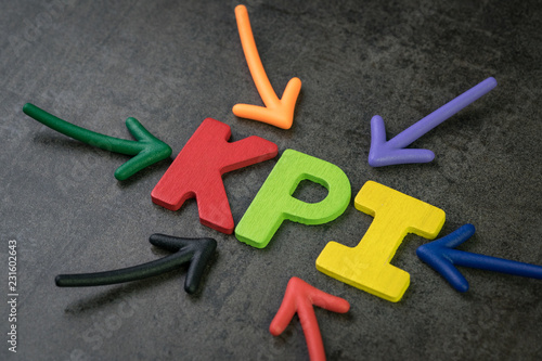 KPI, Key Point Indicator business target and goal measurement concept by multiple arrow pointing to colorful alphabet building the word KPI at the center
