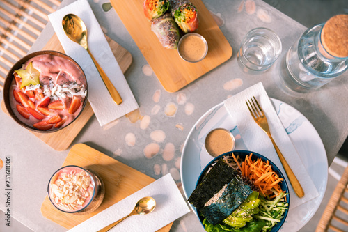 Fototapeta Naklejka Na Ścianę i Meble -  Healthy breakfast. Top view of amazing delicious healthy breakfast standing on the table in famous cafeteria