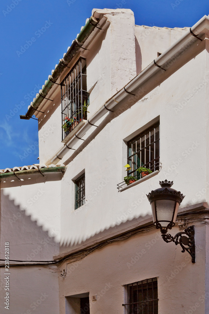 old fashioned outdoor lamp on white wall old fashioned outdoor lamp on white wall