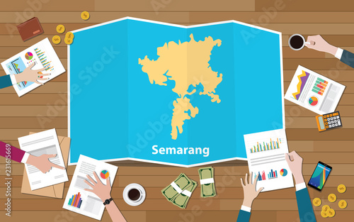 semarang indonesia java city region economy growth with team discuss on fold maps view from top