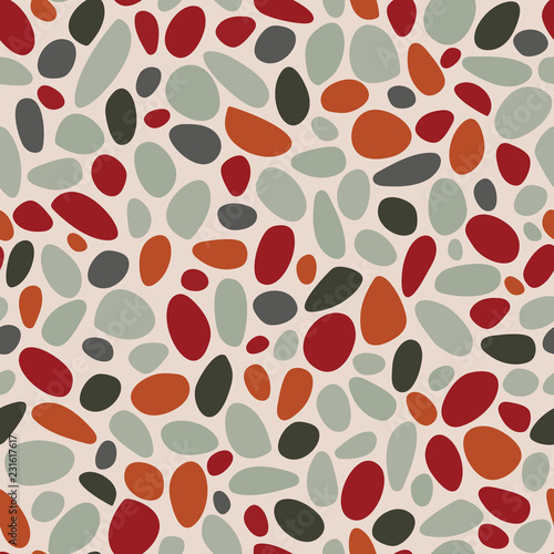 Terrazzo pebble texture pattern in gray, burnt orange and pale green. Light background with multicolor stones. For textiles, fashion, gift wrapping paper, scrapbooking and graphic design projects.