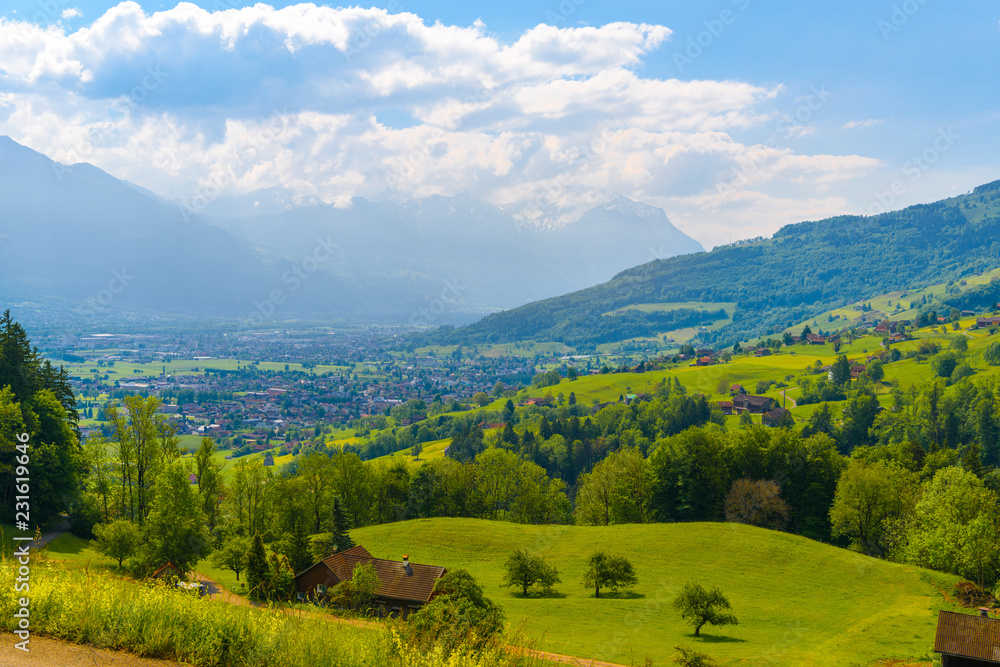 Naklejka premium Wooden cottage houses in mountain village, Grabs, Werdenberg, St